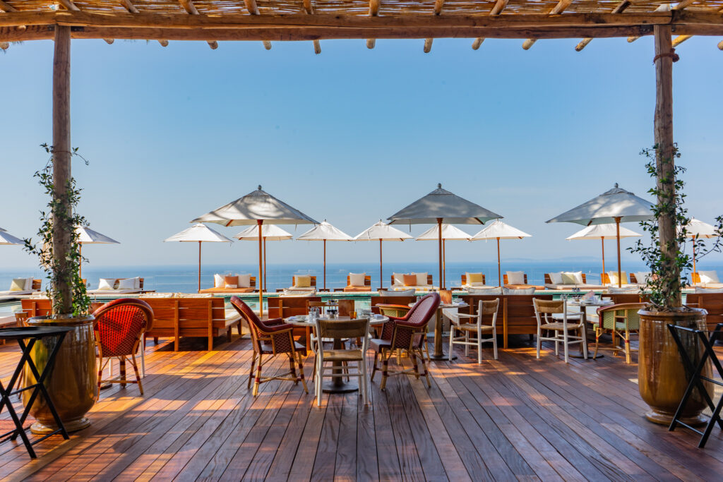 Restaurant overlooking the resort pool in St. Tropez